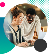 2 agency workers looking at data on a computer